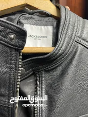  1 جاكيت جلد اسود جديد غير ملبوس مناسب
