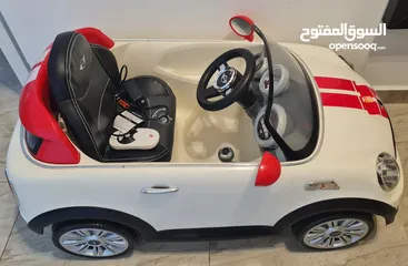  1 سيارة ركوب اطفال (شحن) بحال الجديد