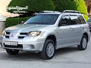  8 ميتسوبيشي آوتلاندر اوتوماتيك 2003 توب نظافة بسعرررر مميززز محرك 2400cc