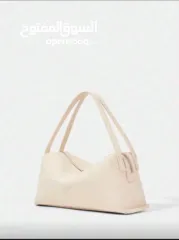  1 شنطة يد وسط