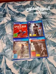  1 العاب ps4 اربع العاب: uncharted.  the last of us. spiderman. tomb raider
