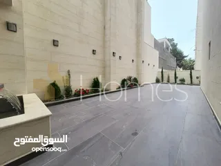  2 شقق مع حديقة للبيع في رجم عميش بمساحة بناء 221م