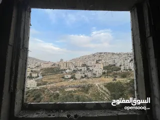  2 شقة عظم اطلالة ثلاث اتجاهات كاشفة لا يمكن التسكير عليها مستقبلا في اجمل مناطق نابلس الحيوية