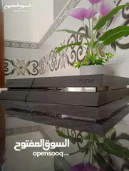  1 بلاستيشن 4 مع جهازين تحكم و7 العابPlayStation 4 with two controllers and 7 games