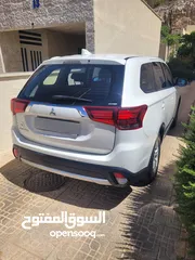  2 ميتسوبيشي أوتلاندر موديل 2018 (قابل للبدل) لون ابيض، دفع رباعي، فحص كامل ومرخصة حديثا لغاية 4/4/2026