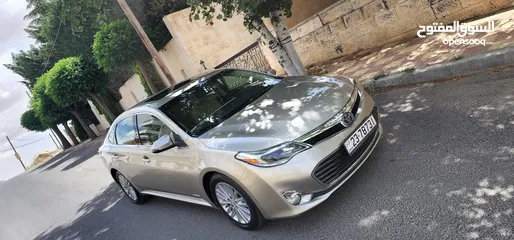  1 تويوتا افالون هايبرد 2015 فل كامل وأعلى صنف Limited وارد و مواصفات أمريكيه مالك واحد فحص كامل