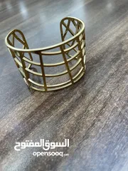  1 اسوارة CK ذهبي اللون مطلي اصلية