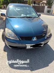  22 متسوبيشي لانسر GLX 2007 1600 cc وارد الخليج الكويت جميع الإضافات بإستثناء الفتحه وجنط إضافي.