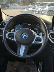  13 BMW x3 30e ترخيص 2022 ترخيص  محرك 2000 هايبرد plug in/يقطع على الشحنه 30 كيلو متر  293 حصان