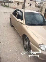  5 كيا تو لون عسلي