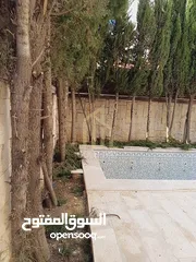  3 شقة أرضية طابقية 350م بتشطيبات راقية في أجمل مناطق عبدون / ref 3021