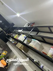  19 كوفيّ ومقهى للبيع في وسط ولايه صحار موقعه مميز