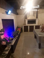  13 شقه ارضيه بشارع الاردن حي المنصور 176متر داخلي وخارجي 100
