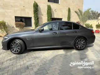  17 ترخيص 2022 BMW  330e  محرك 2000 هايبرد plug in/يقطع على الشحنه 50 كيلو متر  297 حصان