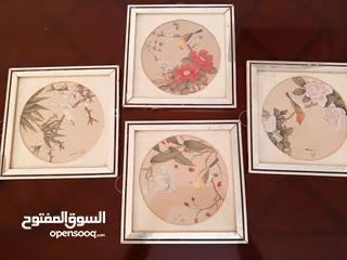 25 لوحات  رسم زيتي.. وتطريز