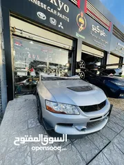  5 Mitsubishi Lancer Evolution 9  وارد اليابان ممشى قليل بحالة ممتازه متوفره كامله