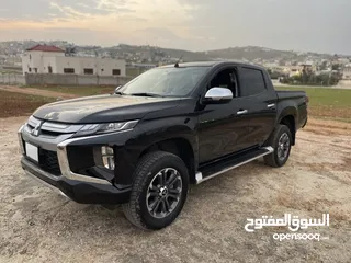  1 بك اب ميتسوبيشي 2022 بحال الوكاله مستخم اول كرت ابيض اربعه جيد لون اسود استخدام بسيط جدا