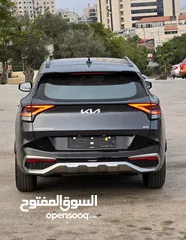  6 كيا سبورتاج هايبرد 2023 - فل كامل مع بانوراما - غرفة مميزه - عداد قليل اصلي - إمكانية التقسيط.