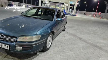  25 اوبل اوميجا للبيع السياره ب حاجه ل صيانه (القير + صنوبرصات) كاوشك جديد كراسي كهرباء السياره فحص خالي