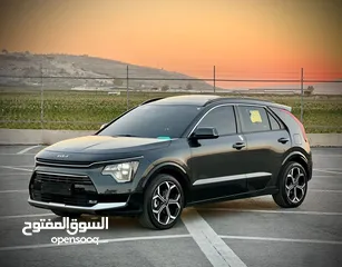  17 كايا نيرو  هايبرد (بنزين+كهرباء ) فل الفل فتحة سقف  /2022 عداد قليل 18000Km