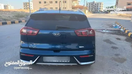  18 كيا نيرو لون كحلي فحص 2 جيد بسعر مغري قابل للبدل