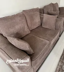  2 Two seater brown sofa ( 2 set ) 20 each . 40 for 2 sofa