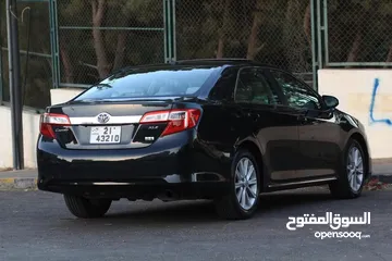  6 تويوتا كامري لون كحلي مميز موديل 2014 للبيع بحالة مممتازة لا تحتاج لأي نوع من الصيانة