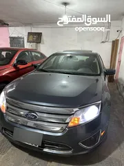  21 Ford Fiosion 2011فورد فيوجن فل الفل لون بترولي مميز داخلية مميزة جدا سيارة غنية عن التعريف