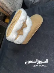  14 أضيفي لمسة من السحر على إطلالة أميرتك الصغيرة مع تشكيلتنا المميزة من ملابس البنات الأنيقة و أحذيتها