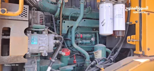  12 جرافات عدد 2  Volvo F180 +Volvo E180