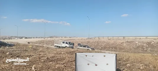  7 ارض مميزه للبيع مقابل شارع الميه الحزام الدائري اربد