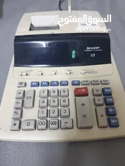  1 آلة حاسبة ماركة SHARP