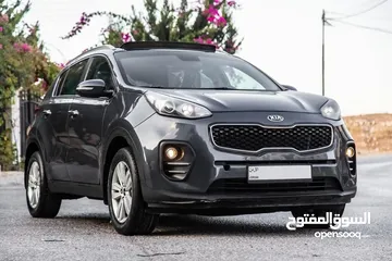  1 Kia Sportage 2018  السيارة وارد و بحالة الوكالة   محرك :  1600 سي سي 4 سلندر  بنزين   اللون : كحلي م