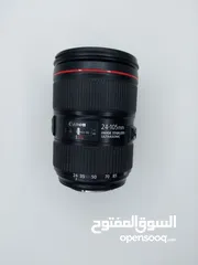  4 للبيع عدسة 105-24 canon الأصدار الثاني الخط الأحمر، نظيفة جدا+ هود للعدسة مجانا