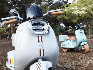  11 moto électrique pour enfants 12V Vespa 1à5 ans