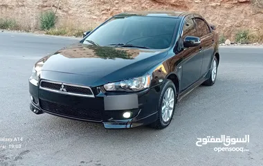  22 متسوبيشي لانسر فراشة موديل 2015 فحص مرفق مع الصور بحالة الوكاااااالة  ماشية 49 الف km  أصلي