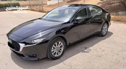  14 مازدا زوم 3 SkyActive مايلد هايبرد 2023 وارد الخياط عداد 43 ألف فقط كرت ابيض