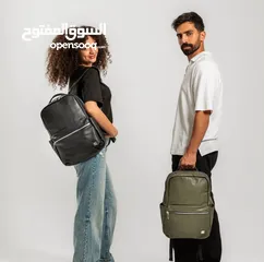  18 شنطة يد مميزة من براند WIWU جلدها مرتب وعليها رقم سري بكفالة الوكيل الحصري