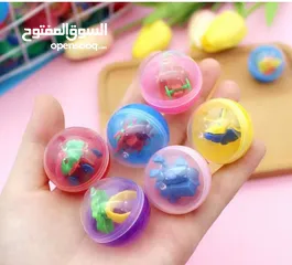  30 ماكينات مصاص و علكة وطابات هدايا و هزازات بالعملة