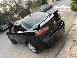  15 ميتسوبيشي لانسر فراشه موديل 2015 فحص كامل 7 جيد بحالة الوكاله ممشى 118 ألف كيلو