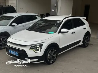  2 كيا نيرو لون ابيض