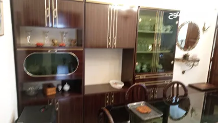 1 خزائن وطاولة سفرة