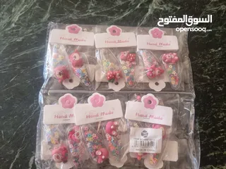  12 اكسسورات بسعر ه 90 درزن اشكال وانواع مختلفه مطلوب 500 دينار