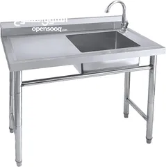  1 stainless steel sink and table