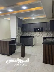  16 شقة للبيع – فرصة لا تعوّض في مادبا / حي الرشاد بسعر حرق