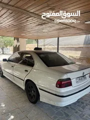  2 Bmw520 موديل 1997محدثة 2003 فل ماعدا الفتحة  فيها شاشة وجلد سقفية الكنتارا وكاريون فايبر من الداخل م