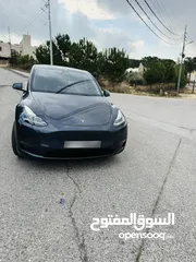  18 تيسلا سبع مقاعد داخله بشركة تيسلا الأردن  موديل Y LONG RANGE DUAL MOTOR 2022