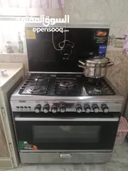  1 طباخ وميز تلفزيون