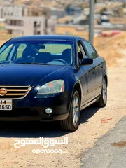  2 نيسان التما بنزين ماتور 2500 لون اسود