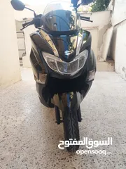  11 سوزوكي بيرجمان لون اسود